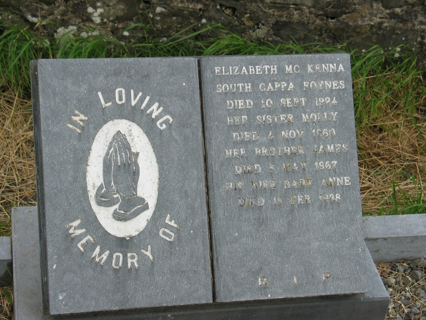 Slate open-book headstone for Elizabeth McKenna of South Cappa, Foynes, with memorial text for Molly, James, and Baby Anne.
